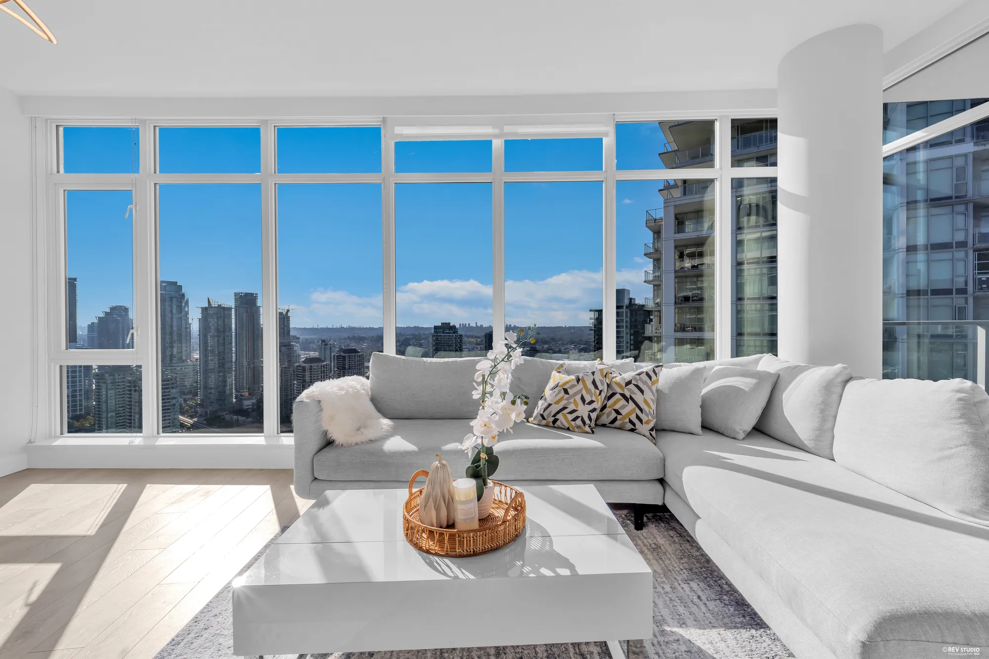 The seating area in the corner where the two glass walls meet