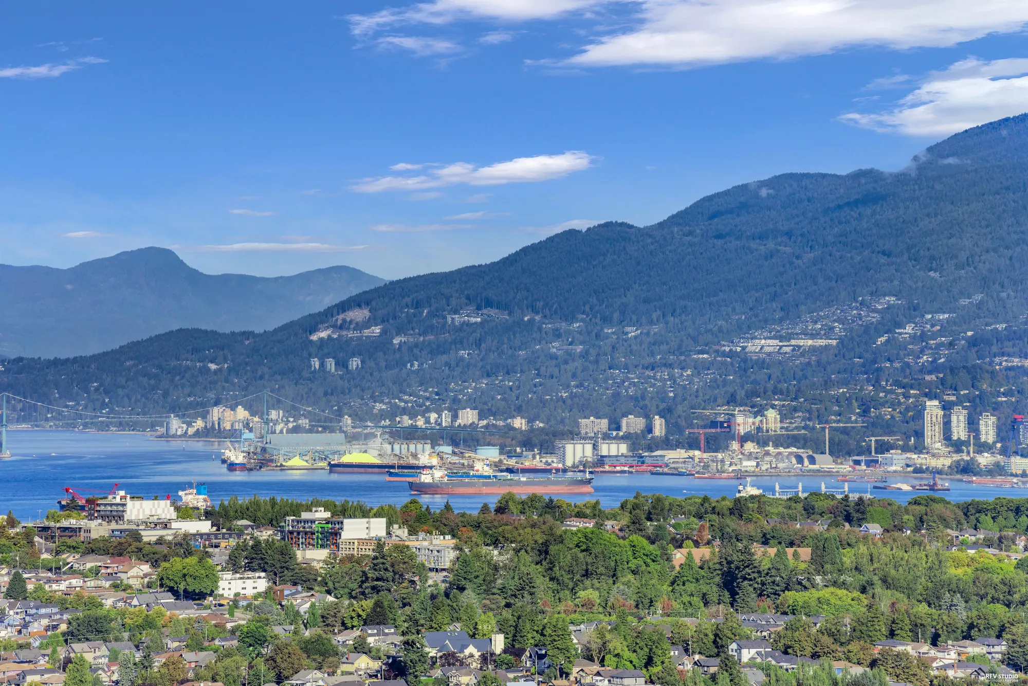 The view west to downtown Vancouver, Burrard Inlet and the North Shore mountains